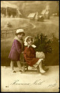 Carte postale intitulée "Heureux Noël" représentant deux enfants avec une luge. Correspondance de Raymond Paillart à son fils Louis
