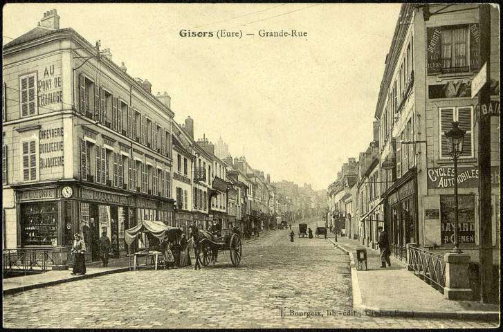 Carte postale intitulée "Gisors (Eure). Grande Rue". Correspondance de Raymond Paillart à sa femme Clémence