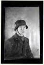 Portrait d'un militaire de rang de la 9e Panzerdivision SS Hohenstaufen, une des trente-huit divisions de Waffen-SS. Sturmmann (soldat d'assaut), volontaire étranger hollandais portant l'insigne de la rune du loup sur le bras
