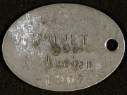 Plaque d'identité militaire de Lucien Brunet, classe 1907, Seine 6e Bureau, matricule 2762
