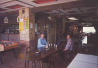 "Chez Maurice". Café. Tabac. Restaurant. Articles de pêche. Bar. Salle de restaurant