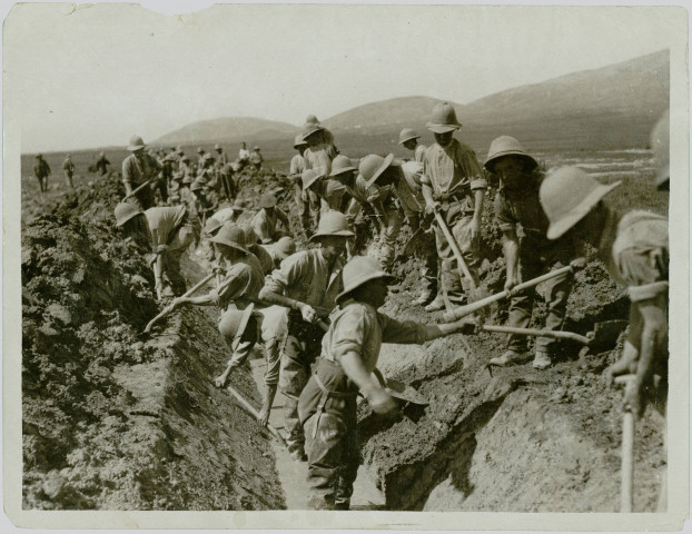 OFFICIAL PHOTOGRAPH TAKEN ON THE SALONIKA FRONT. LABOUR BATTALIONS AT WORK ON THE GREAT DAUBATALI MARSHES DRAINING THE LAND TO PREVENT MALARIA.
