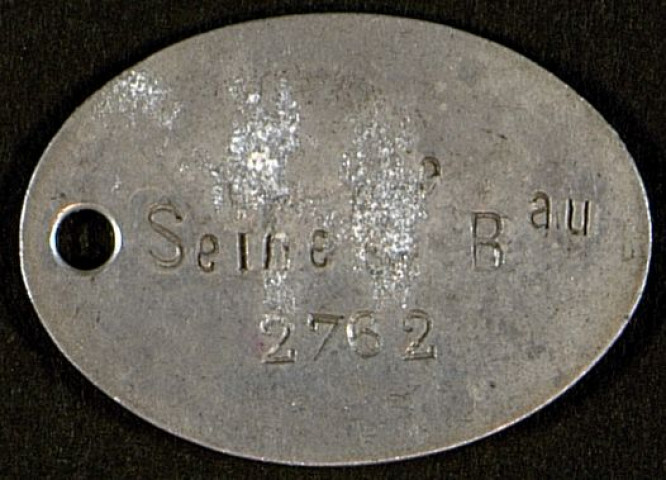 Plaque d'identité militaire de Lucien Brunet, classe 1907, Seine 6e Bureau, matricule 2762