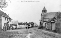 Villers-Bocage. La rue principale, l'église